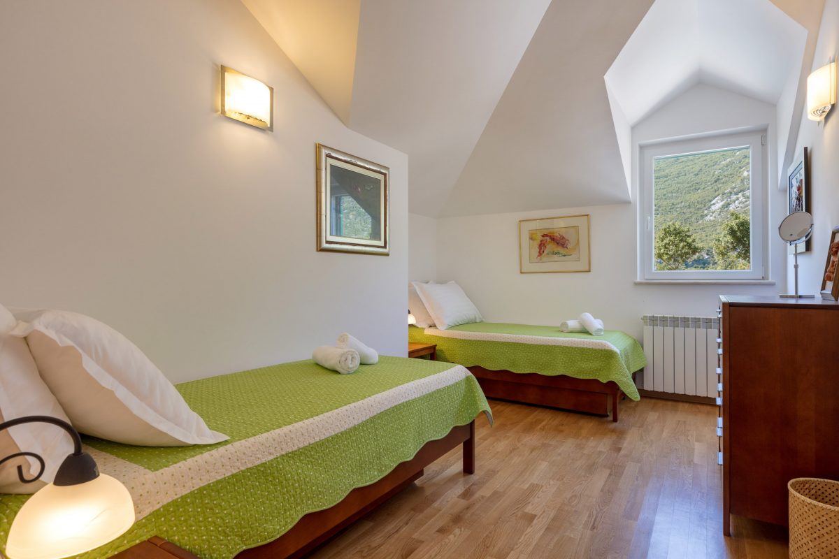Twin bedded room in the Villa Roglic